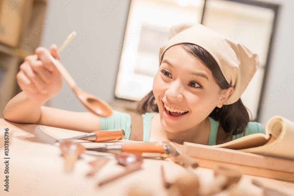 woman woodworking smile happily