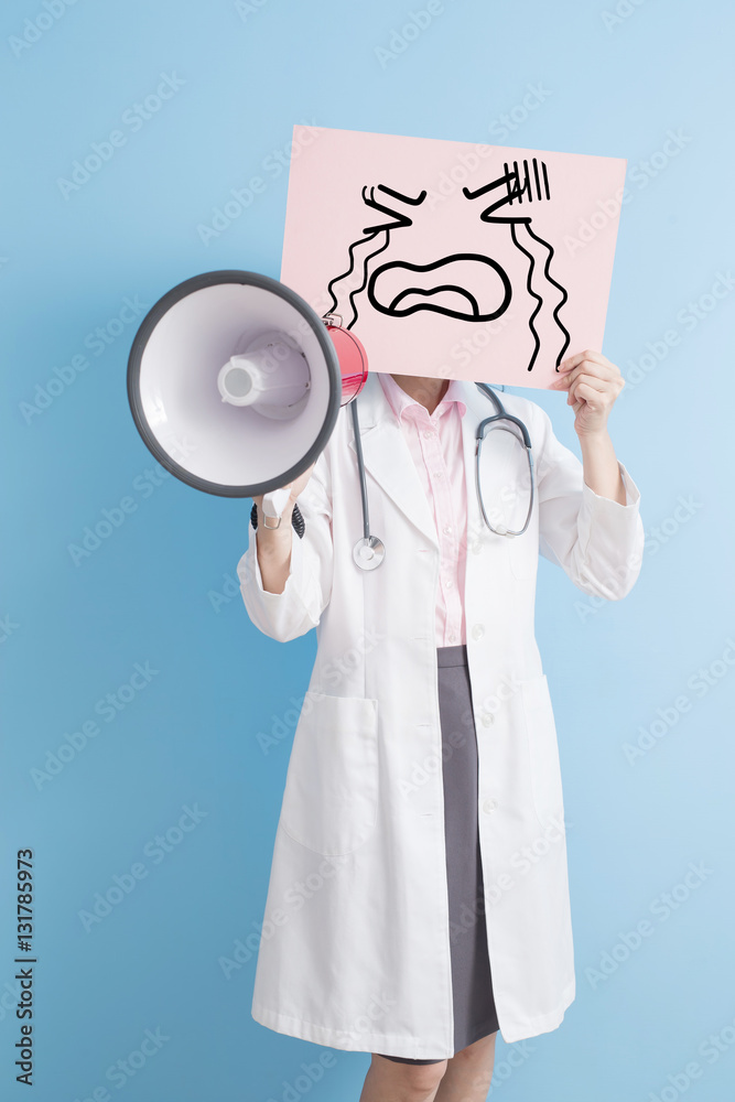 doctor take billboard and microphone