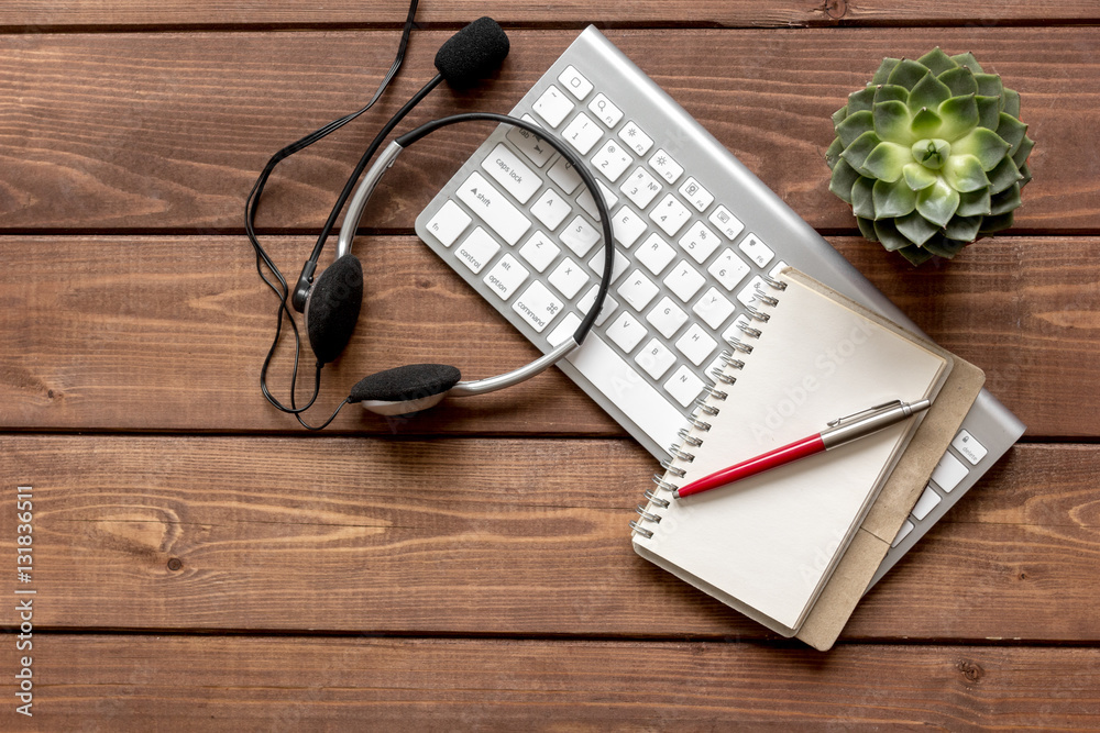 call center manager desktop top view wooden background