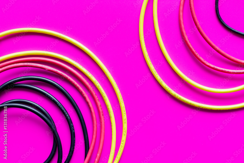 concept network internet cable on pink background close up