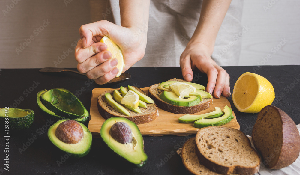 making sandwiches with avocado healthy organic food