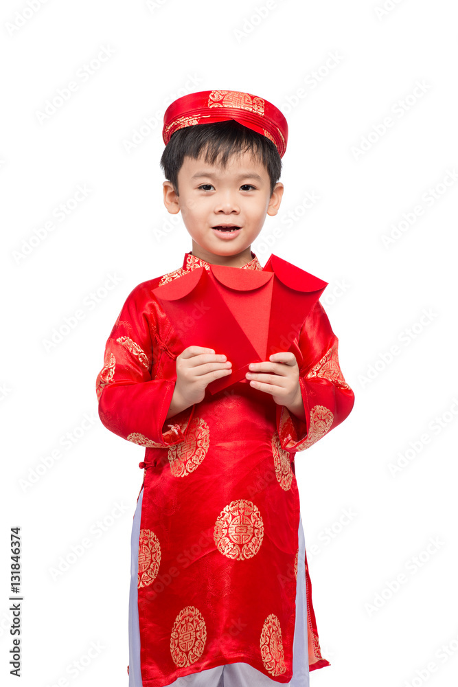 Little Vietnamese boy holding red envelops for Tet. The word mea