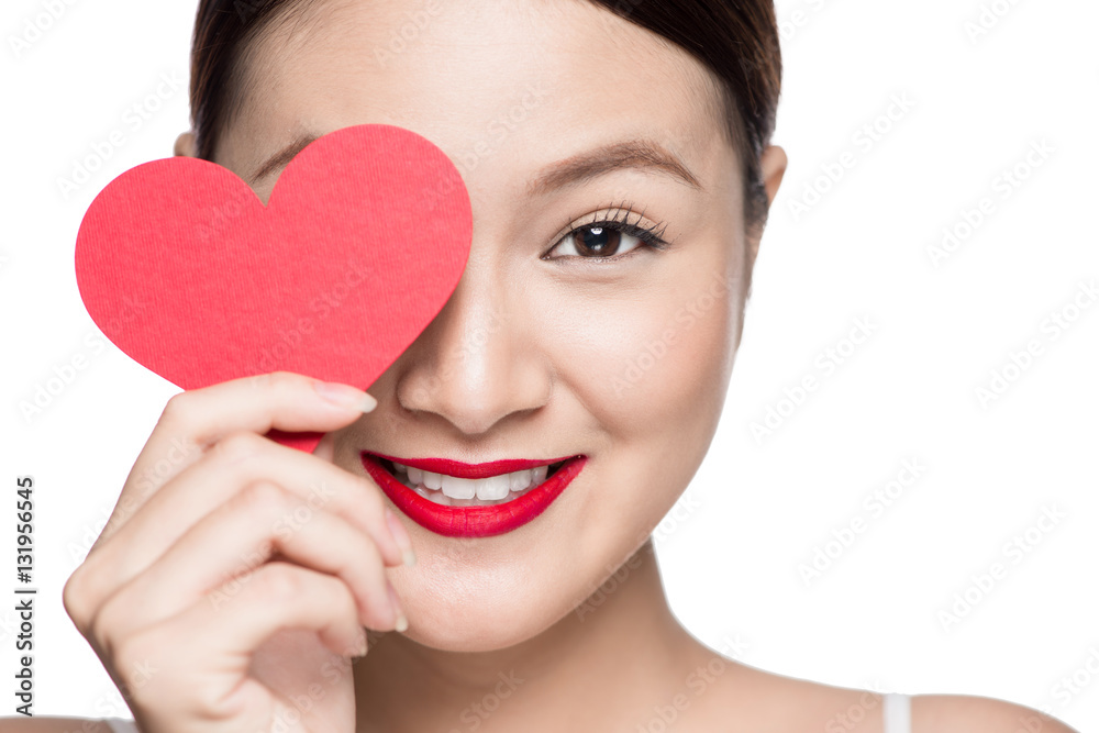 Cute attractive young woman with red heart. Valentines day art