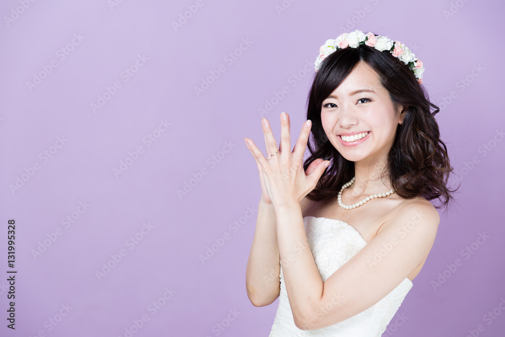 attractive asian woman wedding image on purple background