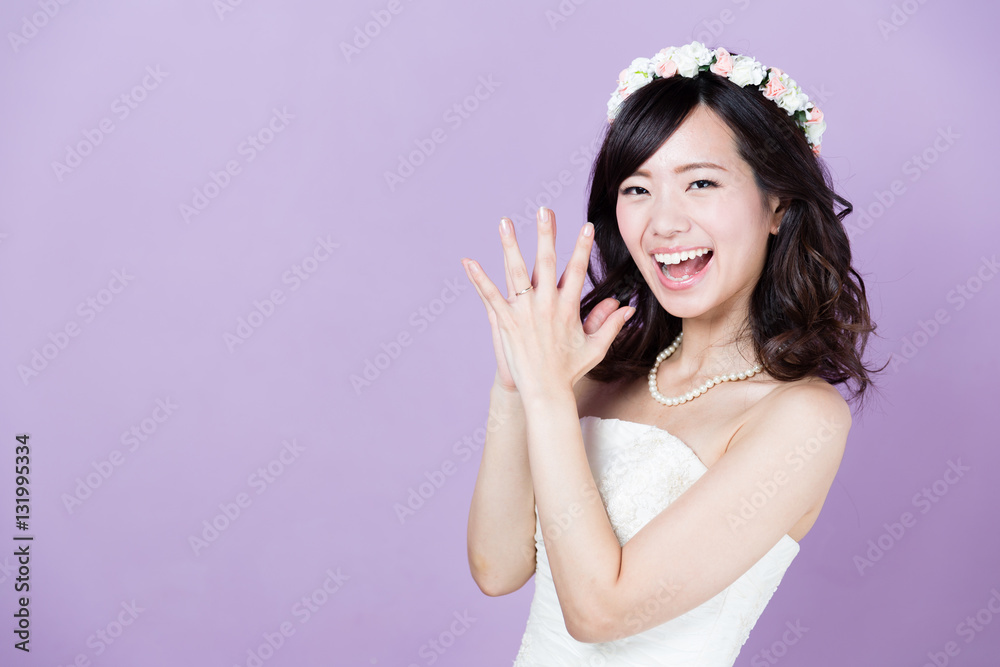 attractive asian woman wedding image on purple background