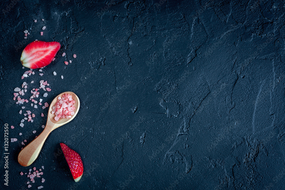 organic cosmetics with extracts of berries dark background top view