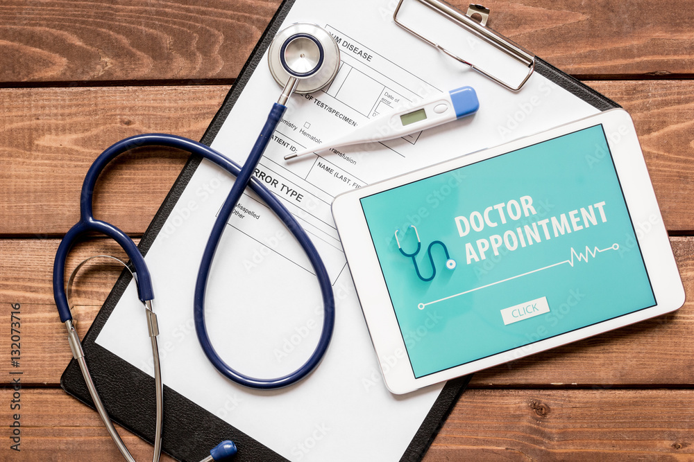 concept of appointment to doctor online top view