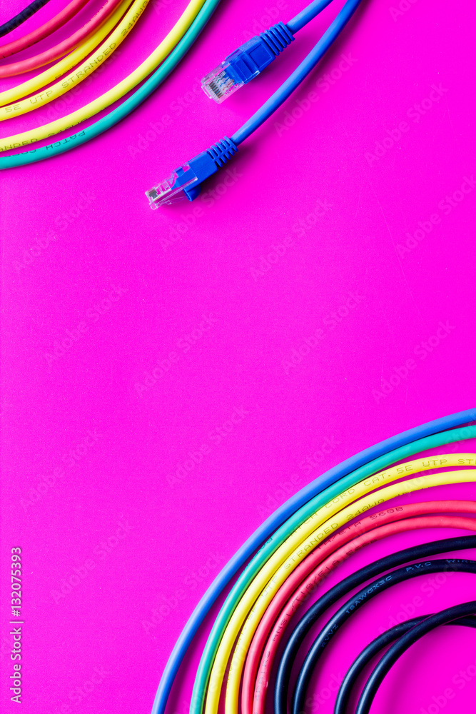 concept network internet cable on pink background close up