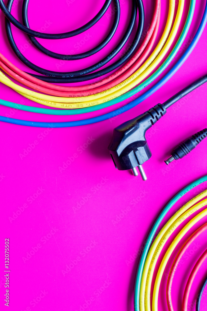 concept network internet cable on pink background close up