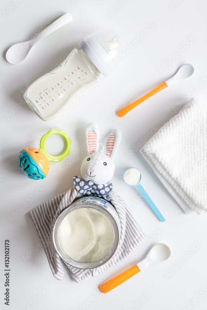 preparation of mixture baby feeding on white background top view