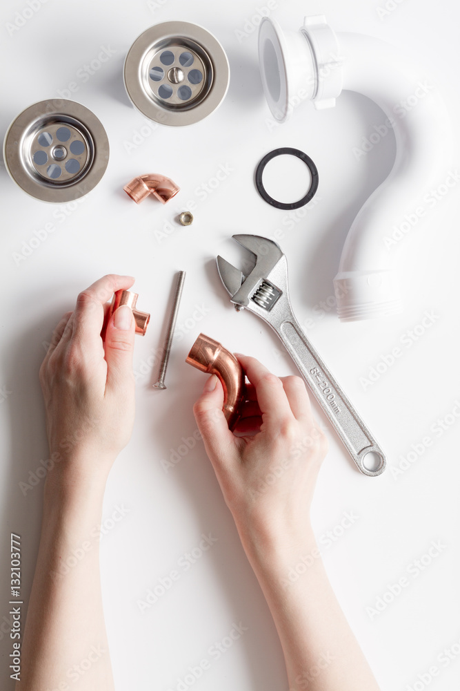 concept plumbing work top view on white background