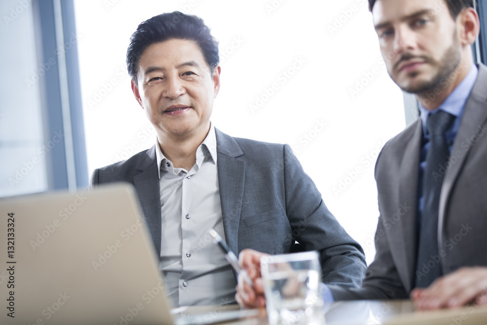 Business people talking in meeting room