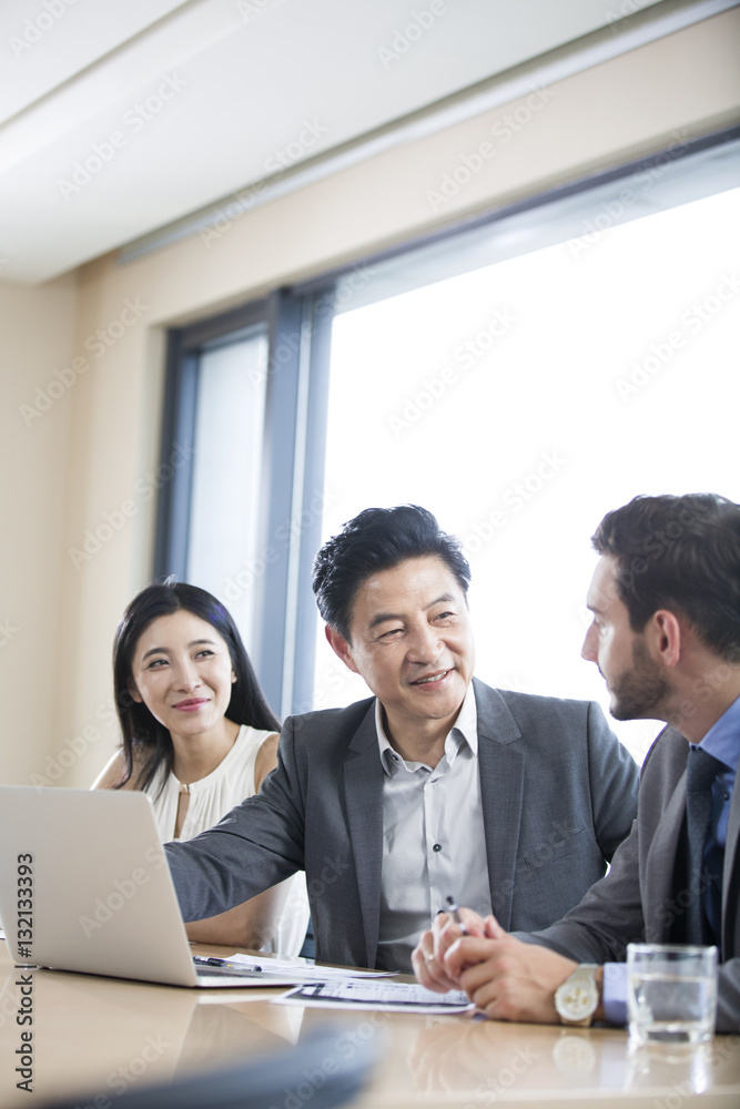 Business people talking in meeting room