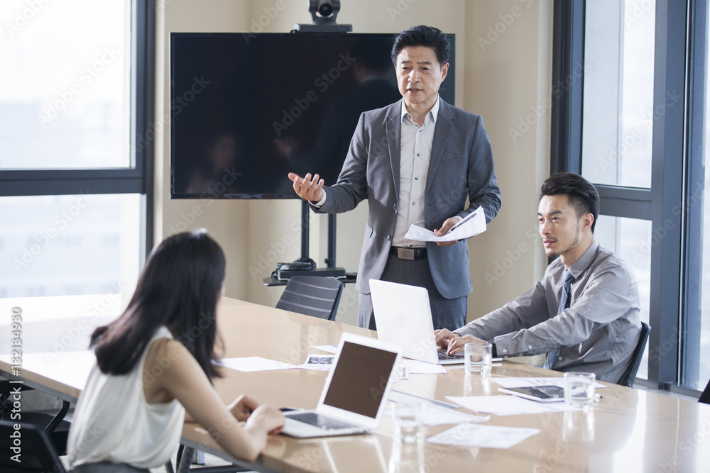 Business people talking in meeting room