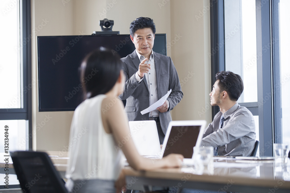 Business people talking in meeting room