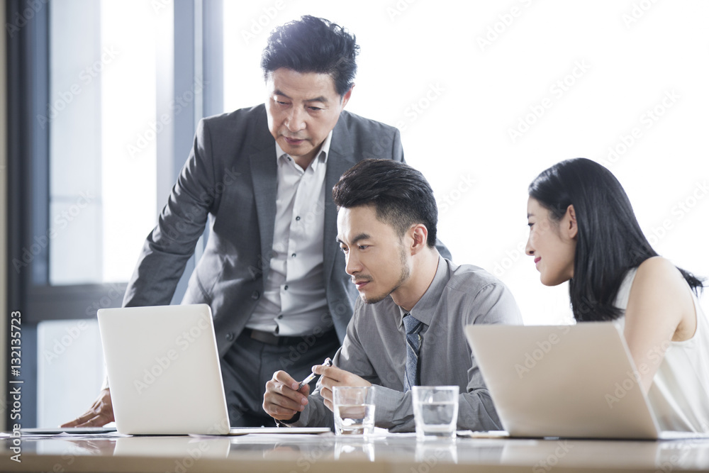 Business people talking in meeting room