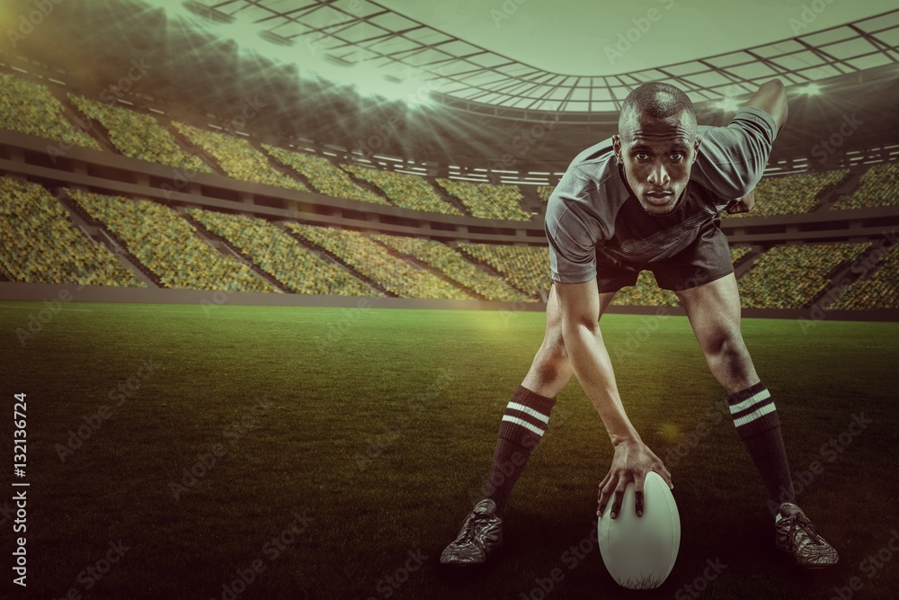 Composite image of portrait of sportsman playing rugby with 3d 