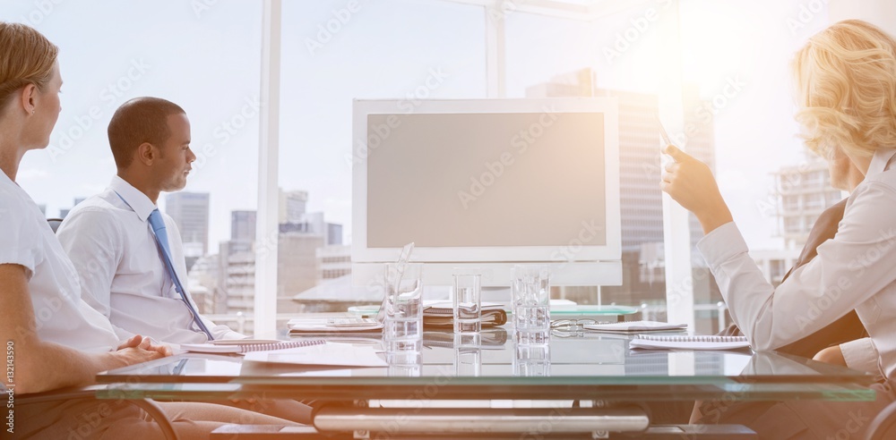 Business people gathered during a video conference