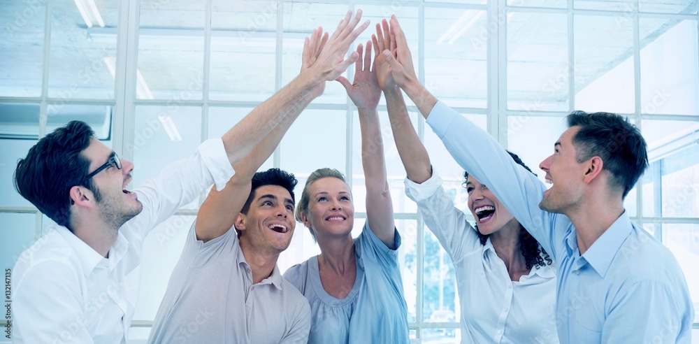 Group therapy in session sitting in a circle high fiving