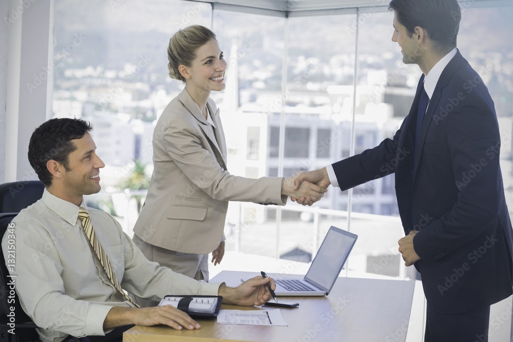 Business people shaking hands with their future patner