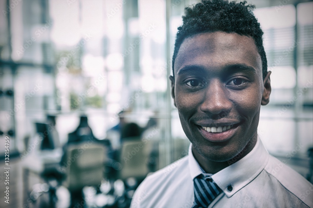 Close-up portrait of smiling businessman