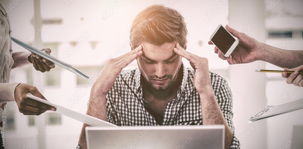 Businessman stressed out at work