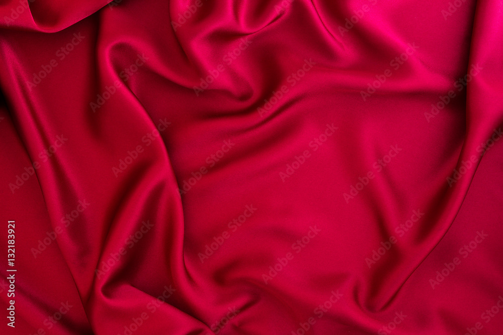 Close up wave red silk or satin fabric background