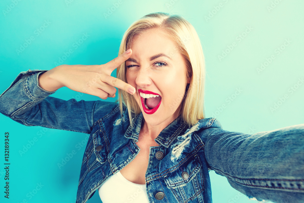 Young woman taking a selfie