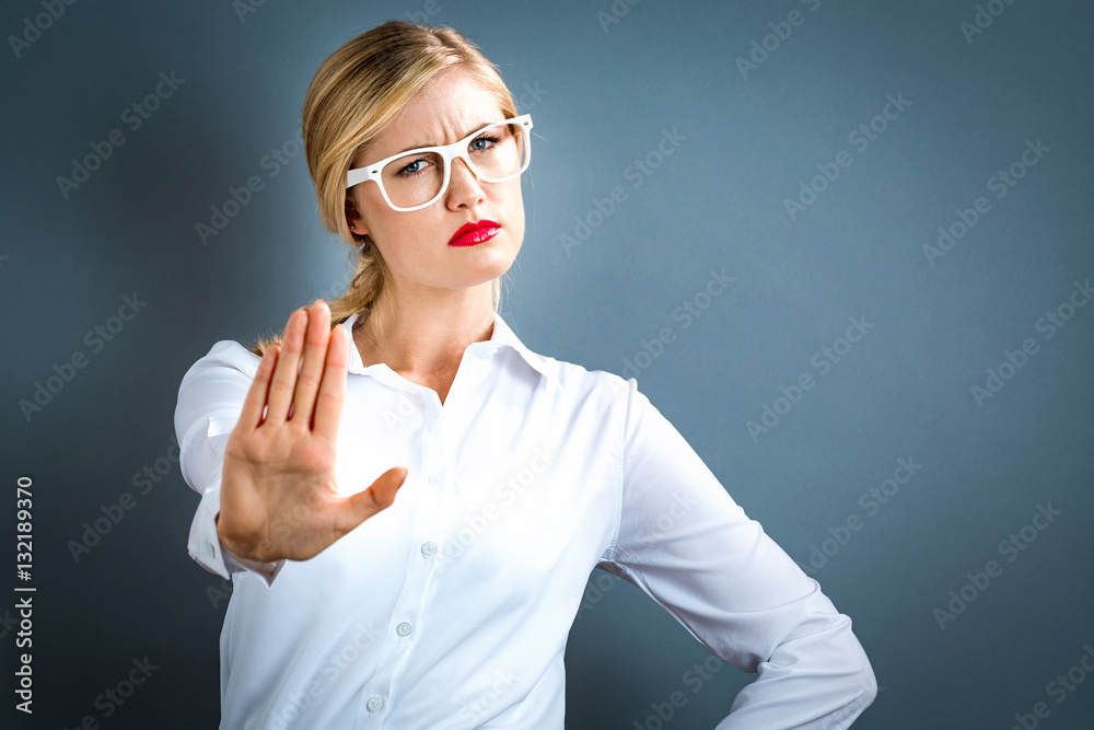 Young woman making a rejection pose