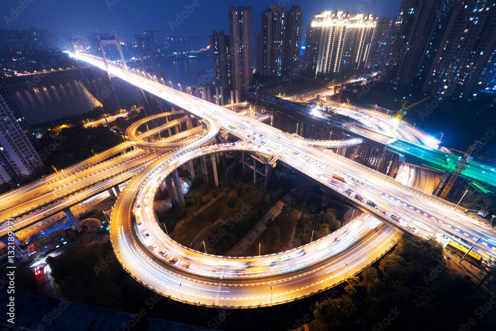 road junction and bridge in modern city at night