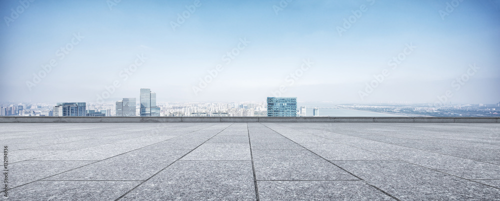 cityscape and skyline of hangzhou new city from brick floor