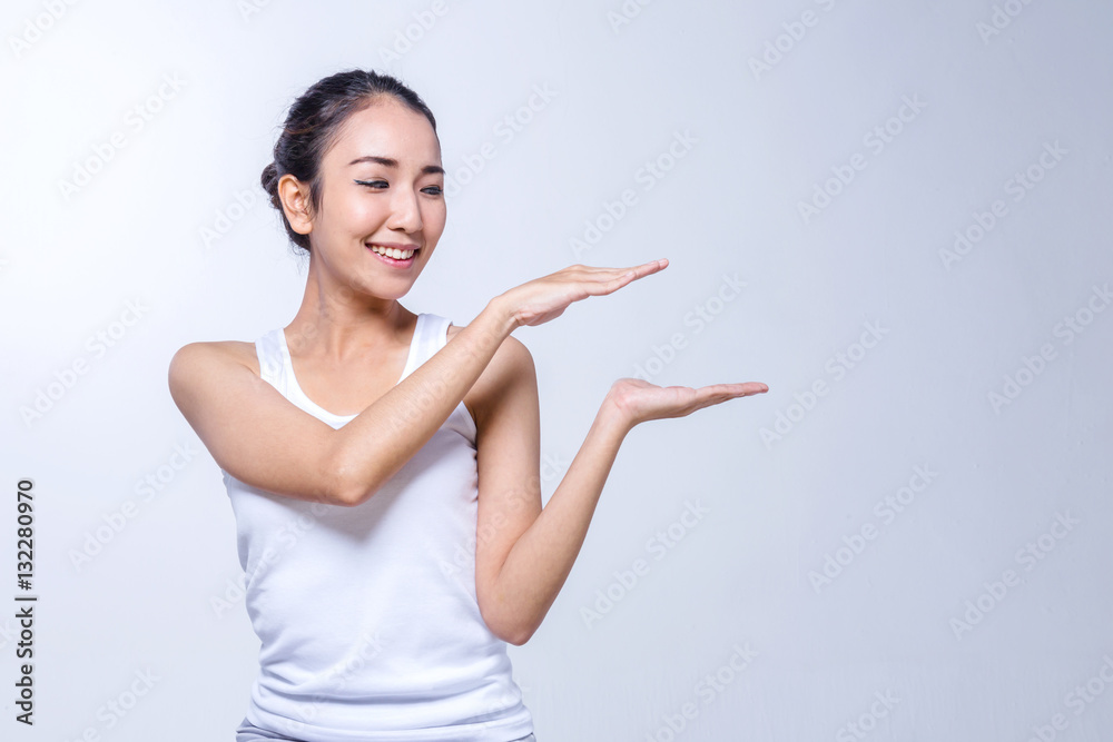 Beauty Woman face Portrait, girl points by hand, girl showing pr