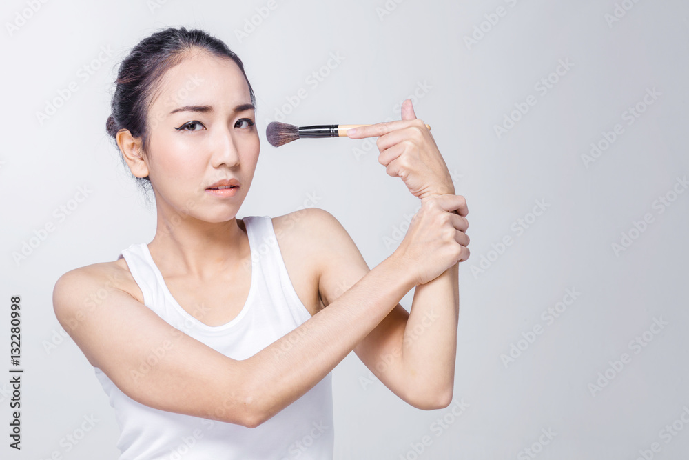 asian beauty girl  force to makeup beauty concept on white backg