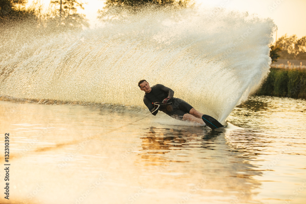 Wakeboarding on a lake with splashes