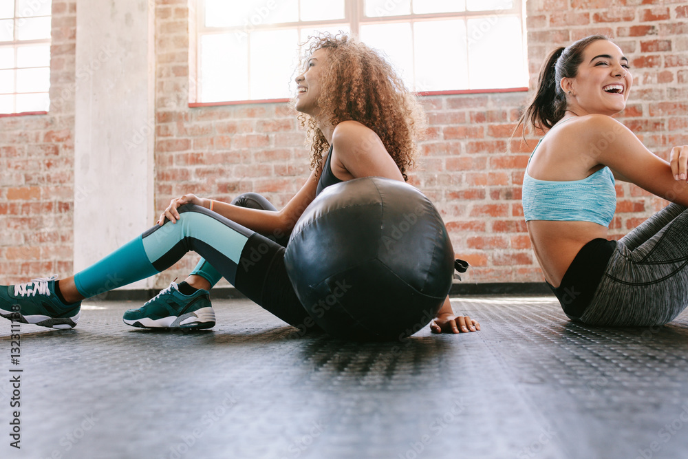 Young women taking a break from workout