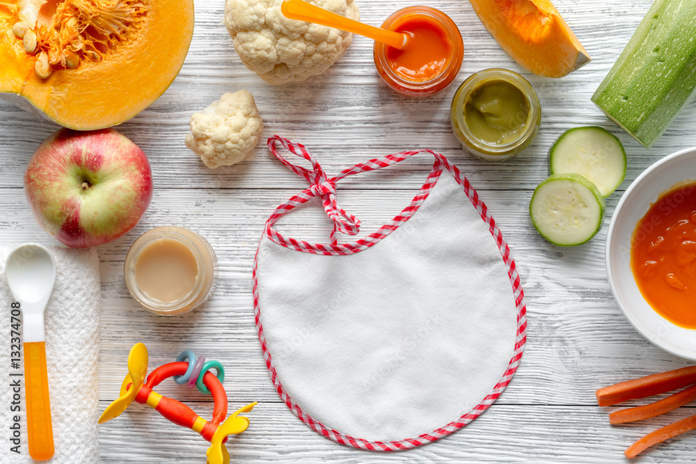 baby vegetable puree on wooden background top view