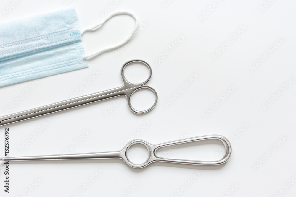 instruments for cosmetic surgery on white background top view