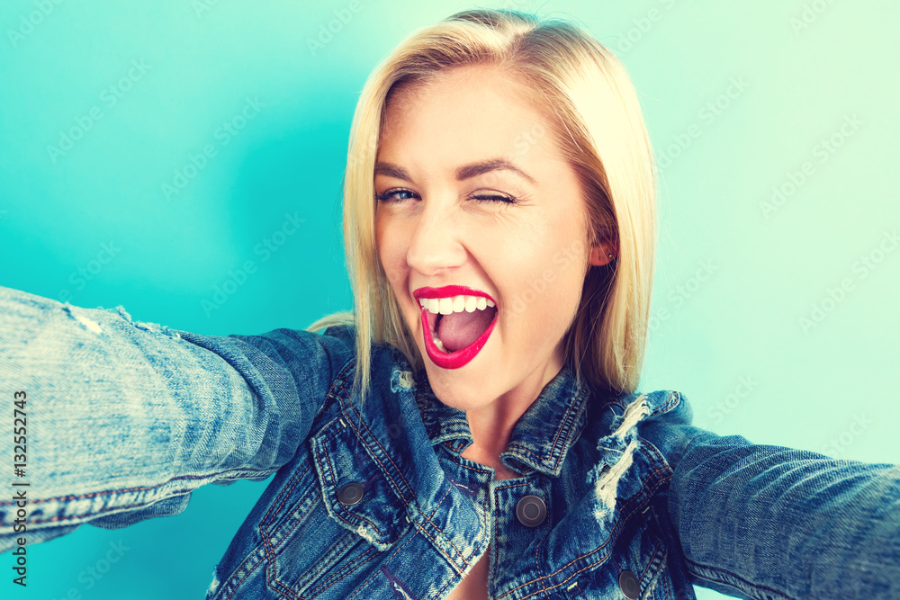 Young woman taking a selfie