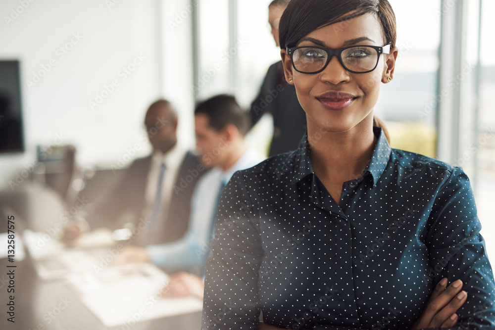 Beautiful young professional woman in office