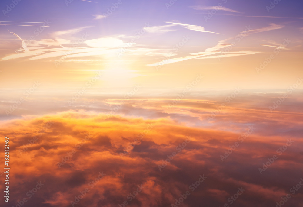 Beautiful sunset above clouds