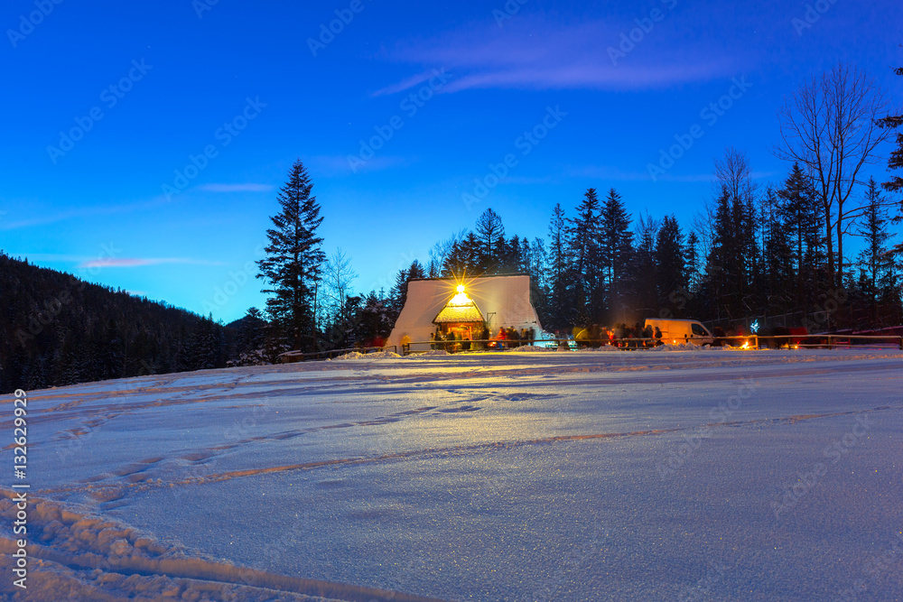 Wooden shelter in Tatra mountains at night, Poland