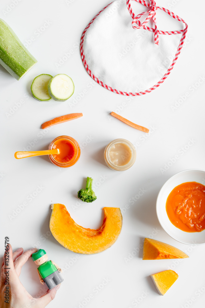 cooking vegetable puree for baby on white background top view