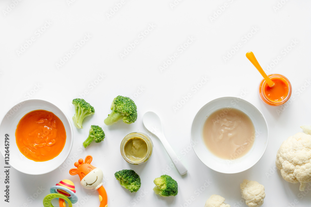 cooking vegetable puree for baby on white background top view