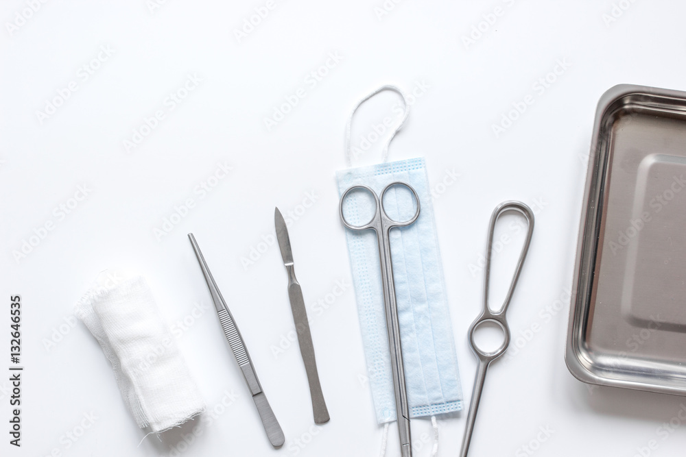 instruments for plastic surgery on white background top view