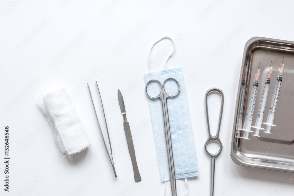 instruments for plastic surgery on white background top view