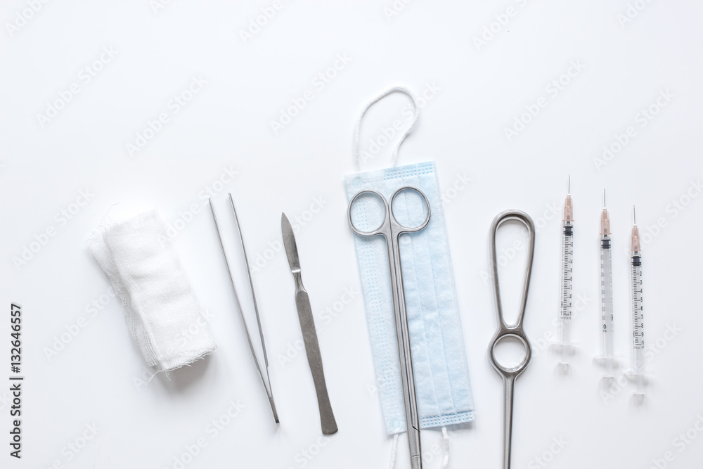 instruments for plastic surgery on white background top view