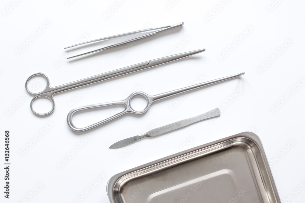 instruments for plastic surgery on white background top view