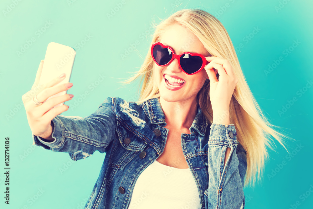 Young woman taking a selfie