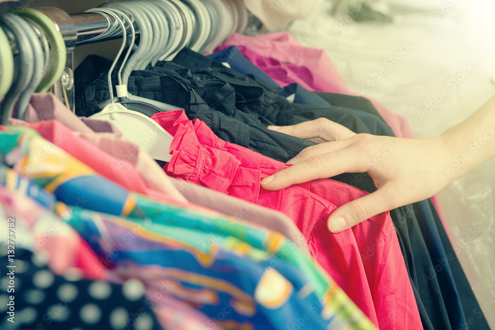 Clothes hanging on the rack in the store