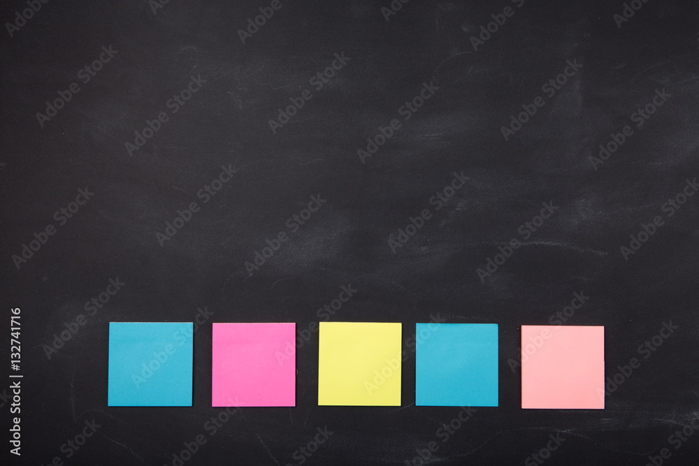 sticky notes on the blank blackboard